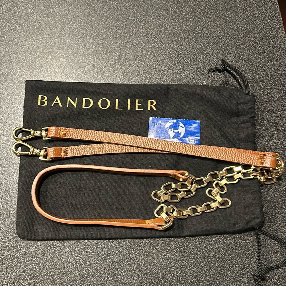 BANDOLIER CROSSBODY STRAP - Removable for hands-free use;Strap measures 49’’